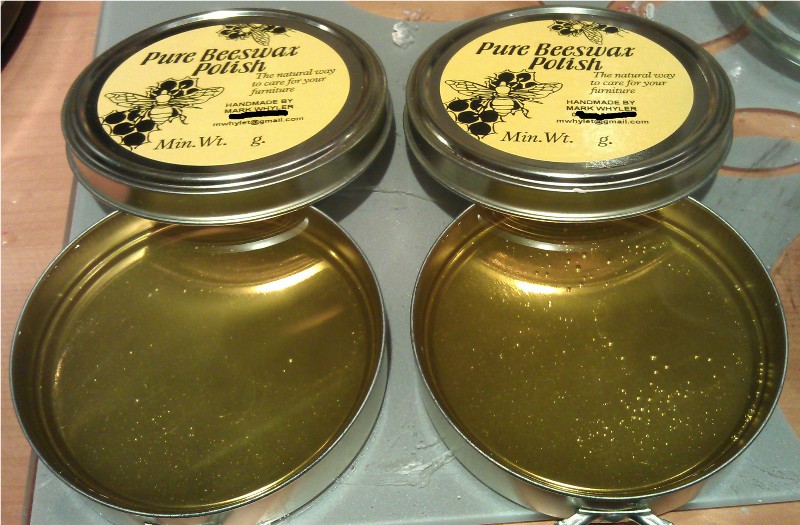 two tins of hot beeswax polish freshly made
